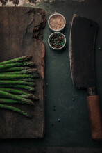 Rustic Picture With Fresh Asparagus On Top Of Chopping Board