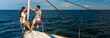 © Spotmatik - Panoramic Hispanic couple sitting together on private yacht