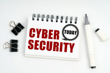 Aufkleber - On a white surface lies a marker, clips and a notebook with the inscriptions Today and CYBER SECURITY