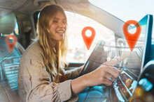 Woman Selects The Destination With Car Gps Navigator