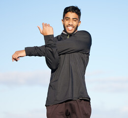 Aufkleber - Stretching is just as important as the workout. Shot of a young man stretching his arms before his morning run.