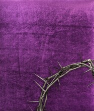 Christian Crown Of Thorns With Metal Nails On A Wooden Desk