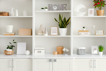 shelf unit with beautiful decor in room