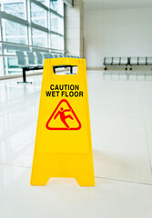 Wall Mural - Sign showing warning of wet floor