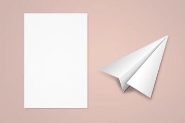 Canvas Print - A white paper plane and blank paper on background.