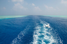 View Of Channel In Tropcial Coral Reef With Boat Wake