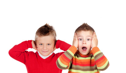 Wall Mural - Children covering the ears and shocked by a loud sound