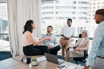 Aufkleber - sharing ideas is important. shot of a diverse group of businesspeople having a discussion in the off