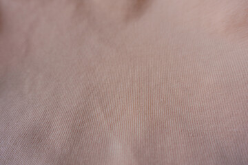 Wall Mural - Close view of pale melon pink cotton jersey fabric