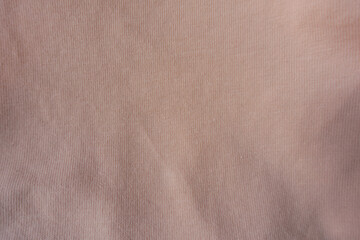 Wall Mural - Texture of pale melon pink cotton jersey fabric