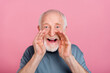 Photo of aged grey hairdo man hands lips yell wear blue shirt isolated on pink color background