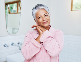 Sticker - What will she get up to today. Portrait of a cheerful mature woman holding her hands together while looking at the camera at home during the day.