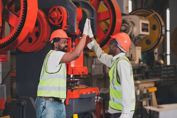 Teamwork African American worker in the factory.Black man afro work heavy industrial