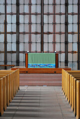 Sticker - Vertical shot of the altar and benches in the church with beautiful interior