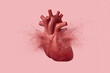 The concept of heart attack, an exploding human heart isolated on pink background. Cardiology and medical care for infarct