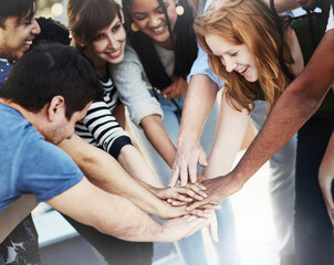 Poster - As a team. Cropped shot of unrecognizable businesspeople coming together as a team.