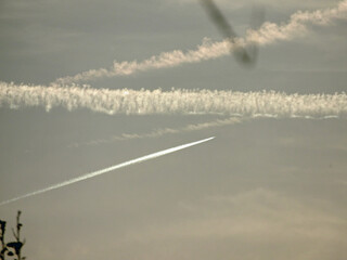 Wall Mural - airplane in the sky with clouds