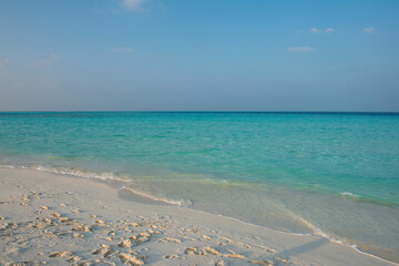 Wall Mural - Panoramic view of remote tropical beach with lagoon