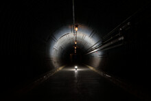 Long Underground Concrete Corridor In A Bunker Tunnel