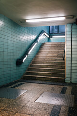 Canvas Print - Vertical shot of a staircase of an underground metro station