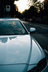 Poster - Vertical shot of a grey car on a road