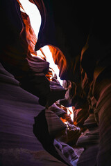 Canvas Print - Mesmerizing view of an antelope canyon with smooth walls with  beautiful sunlight in Arizona