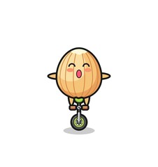 Poster - The cute almond character is riding a circus bike