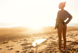 © Cavan Images - Surfer girl ready to surf