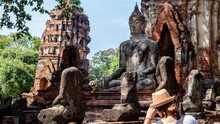 Statue And Ruins Of Wat Mahathat In Ayutthaya, Thailand