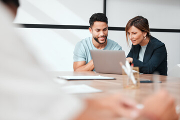 Poster - Getting themselves presentation ready. Cropped shot of two young businesspeople talking in the boardroom during a meeting with their colleagues.