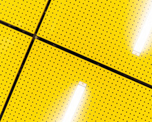 Closeup Of A Tiled Modern Ceramic Yellow Floor With A Pattern, Lights Reflecting