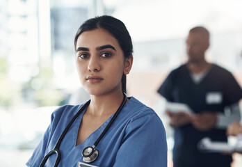 Poster - Dr is not just my prefix, Its my superpower. Shot of a young female doctor standing in the office of a hospital.
