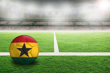 Wall Mural - Football With Flag of Ghana in Soccer Stadium With Copy Space