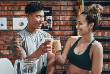 Aufkleber - Cheers to a fit and healthy life. Cropped shot of two young sportspeople making a toast with milkshakes while working in a gym.