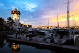 Fototapeta  - Mexico, Panoramic view of Marina and yacht club in Puerto Vallarta at sunset.