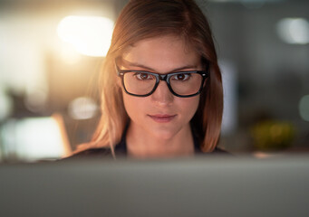 Canvas Print - Dont wish for it, work for it. Cropped shot of a young designer working late in the office.