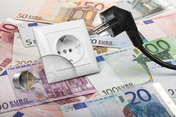 Sticker - Energy Saving concept. Energy costs and electricity prices. Electricity consumption concept. Euro Banknotes with lamp