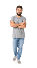 Wall Mural - Handsome man in grey t-shirt on white background