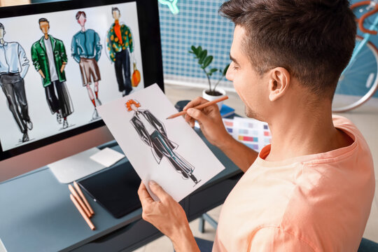 Male fashion designer working in studio