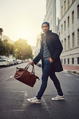 Poster - Styled for the city. Shot of a fashionable young man out in the city.