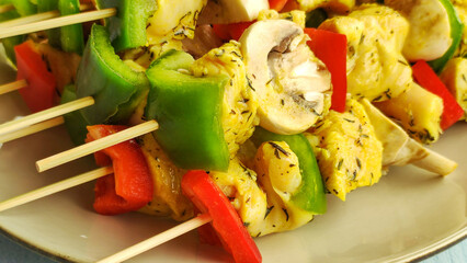 Wall Mural - chicken skewer with mushrooms and raw peppers