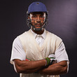 © Duncan M/peopleimages.com - Hes up next. A cropped shot of an ethnic young man in cricket attire isolated on black.