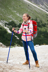 Wall Mural - tourist girl at the dolomites