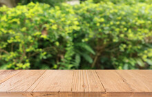 Empty Wood Table Top And Blur Of Out Door Garden Background Empty Wooden Table Space For Text Marketing Promotion. Blank Wood Table Copy Space