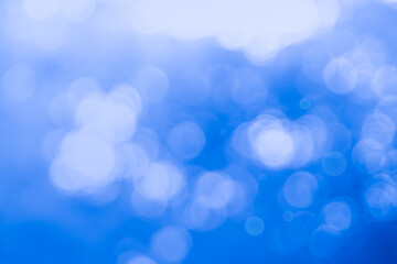 Abstract blurry blue color for background, Blur festival lights outdoor celebration and blue bokeh focus decorative.