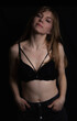 © Олег Мальшаков - Young, cute, blonde girl on a black background