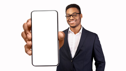 Poster - Business App. Black Young Businessman Holding Big Blank Smartphone In Hand