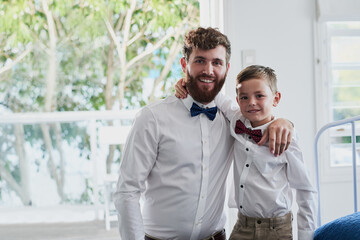 Sticker - Looking dapper with Daddy. Portrait of an adorable little boy and his father dressed in matching outfits at home.