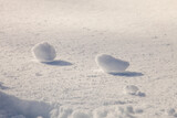 Fototapeta Niebo - pieces of frozen snow on flat snow surface