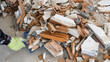 Pile of construction waste after wall demolition in an apartment during remodeling